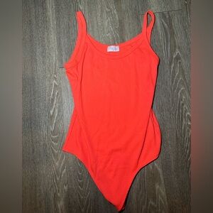 Orange Ribbed Bodysuit